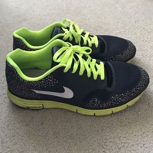 Grey and neon green men’s Nike shoes size 11